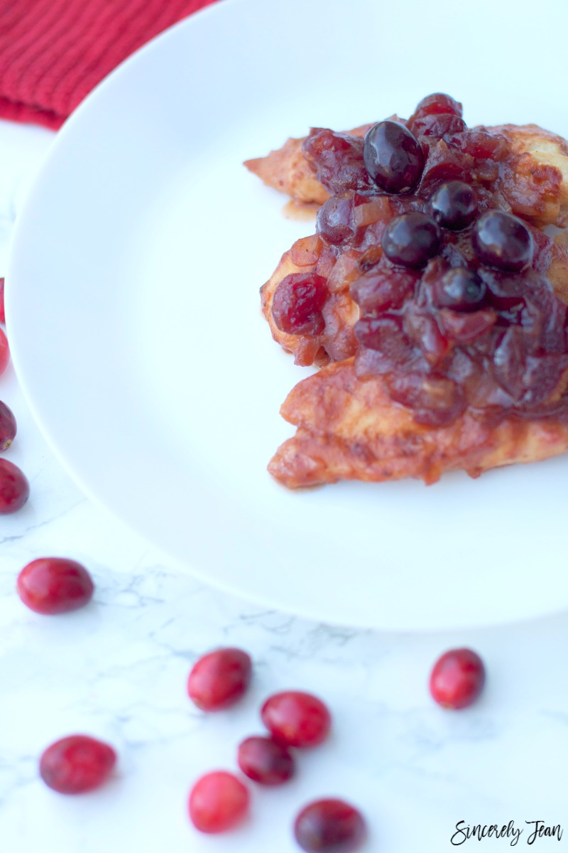 Recipe for cranberry bbq chicken - by SincerelyJean.com. And it only has five ingredients!