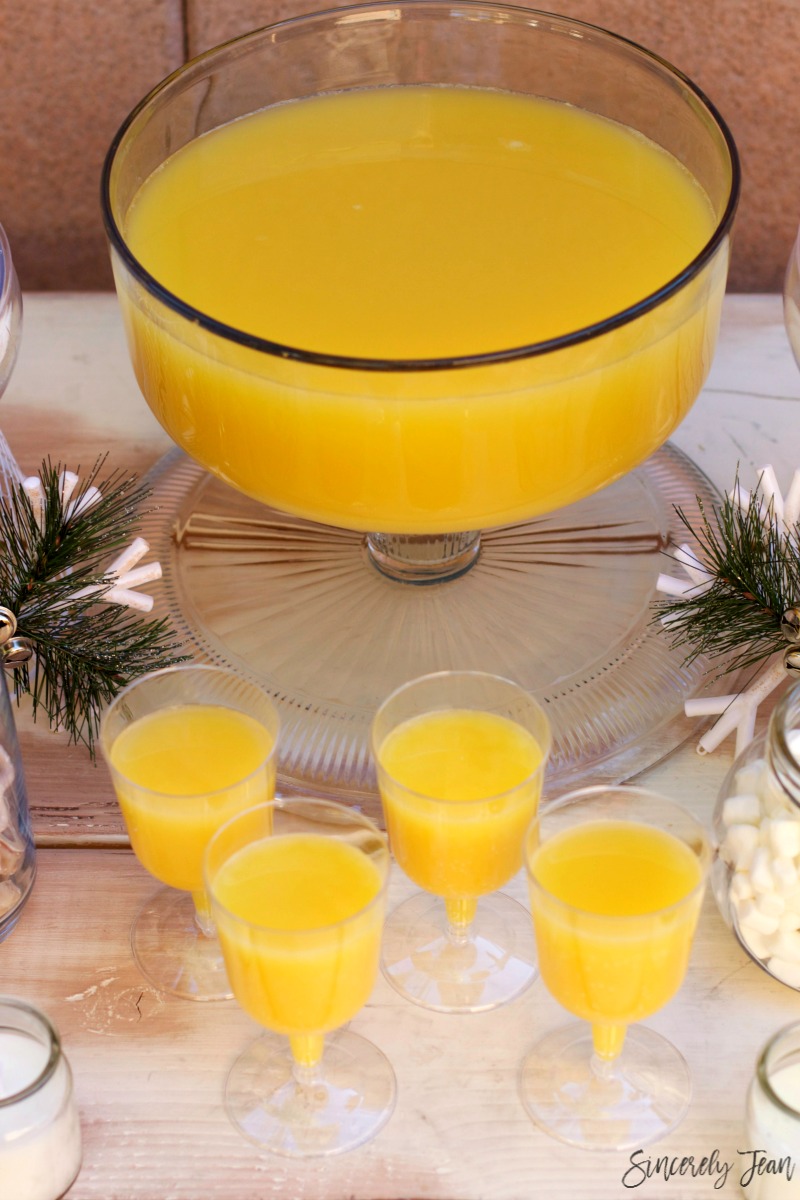 Christmas brunch tablescape and virgin mimosa recipe by SincerelyJean.com